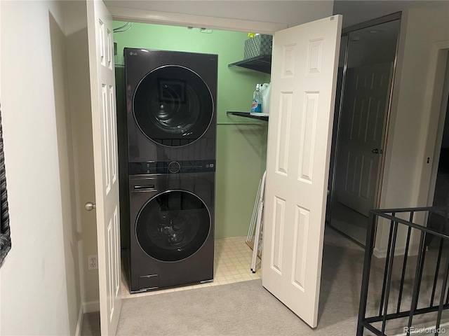 3131 E Alameda Ave Unit 1107, Denver, CO 80209 - laundry area with stacked washing machine and dryer and carpet flooring