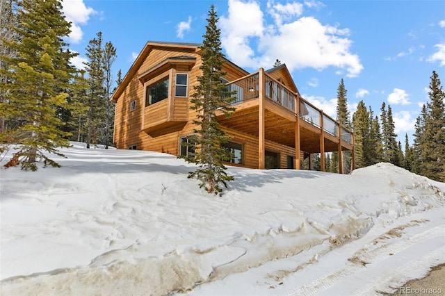 exterior space featuring a wooden deck