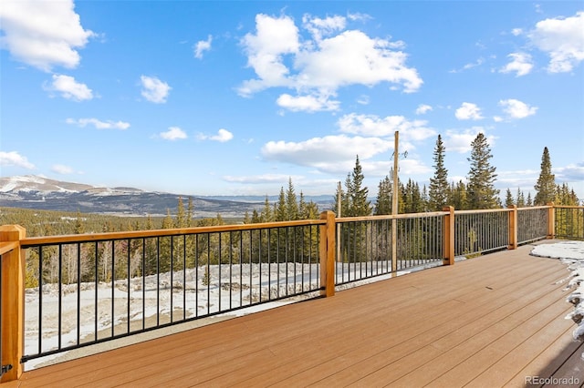 wooden terrace with a mountain view