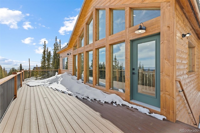 view of snow covered deck