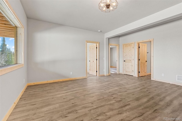 empty room featuring hardwood / wood-style floors