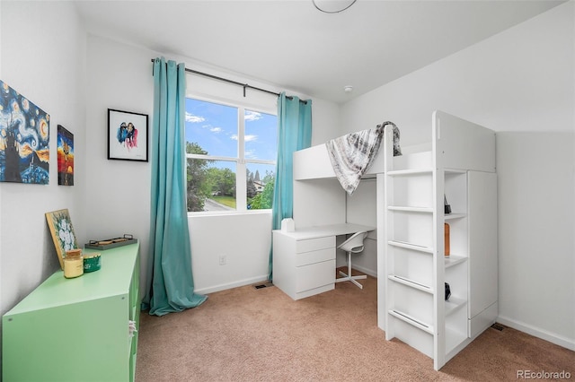 1106 Oak Cir, Lakewood, CO 80215 - carpeted bedroom with baseboards and a desk