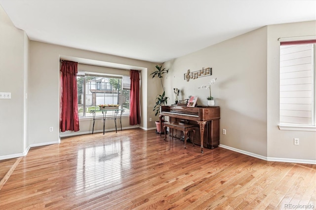 home office featuring hardwood / wood-style floors