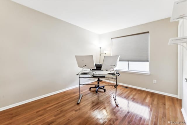 office space featuring hardwood / wood-style flooring