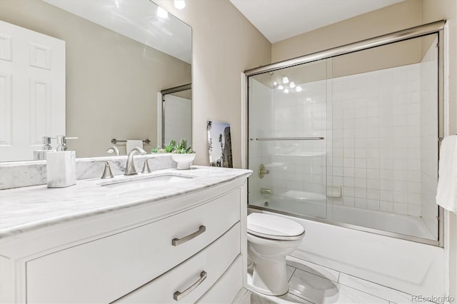 full bathroom with vanity, toilet, and enclosed tub / shower combo