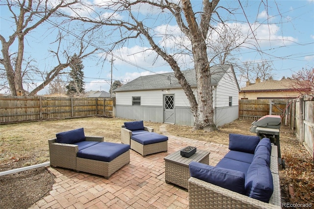 view of patio / terrace featuring an outbuilding and outdoor lounge area