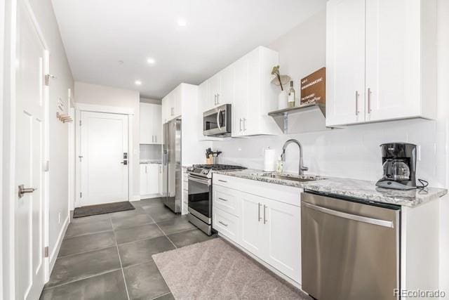 828 Grand Ave Unit 201C, Grand Lake, CO 80447 - kitchen featuring stainless steel appliances, a sink, open shelves, white cabinets, and recessed lighting