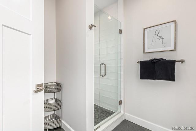 828 Grand Ave Unit 201C, Grand Lake, CO 80447 - full bath with baseboards and a stall shower