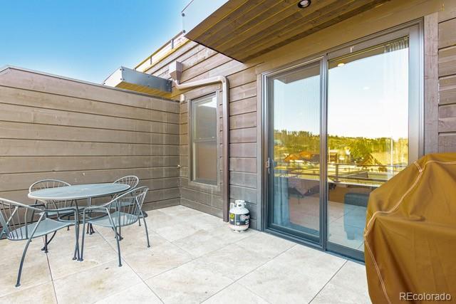 828 Grand Ave Unit 201C, Grand Lake, CO 80447 - view of patio / terrace with outdoor dining space