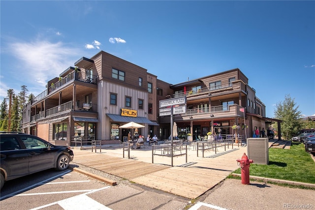 828 Grand Ave Unit 201C, Grand Lake, CO 80447 - view of building exterior featuring uncovered parking