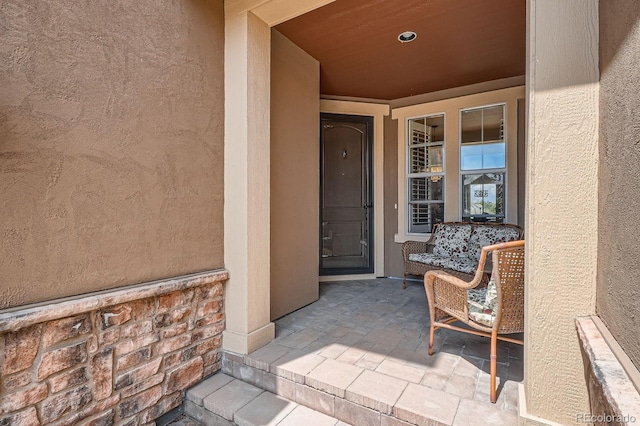 3181 Firenze Pl, Highlands Ranch, CO 80126 - view of exterior entry with stucco siding