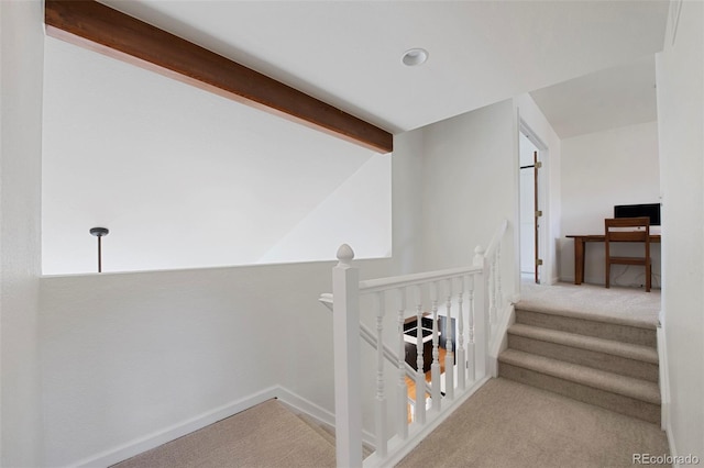 stairs featuring vaulted ceiling with beams and carpet