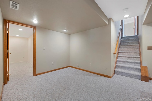 basement featuring carpet flooring