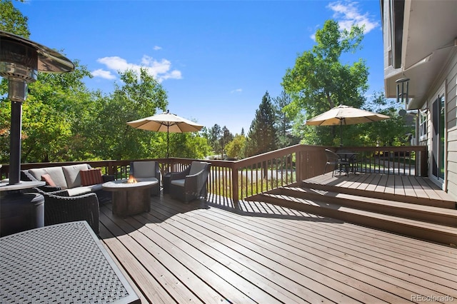 deck featuring an outdoor living space