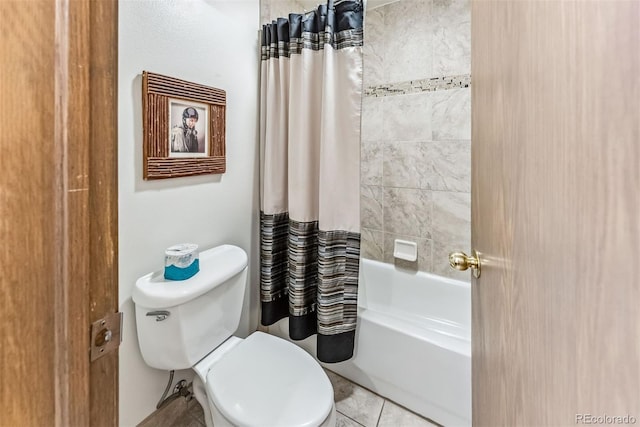 bathroom with toilet, tile patterned floors, and shower / bathtub combination with curtain