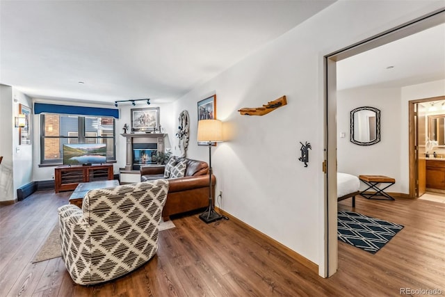 living area featuring hardwood / wood-style floors