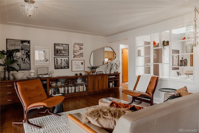 6530 W 26th Ave, Edgewater, CO 80214 - sitting room with wood finished floors and a chandelier