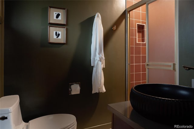 6530 W 26th Ave, Edgewater, CO 80214 - full bathroom featuring toilet and a tile shower