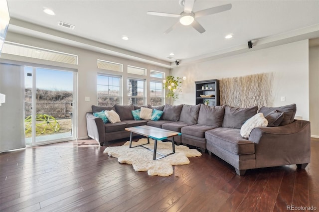 living area with recessed lighting, visible vents, dark wood finished floors, and ceiling fan