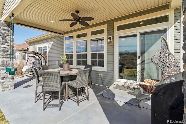 view of patio with ceiling fan and outdoor dining space