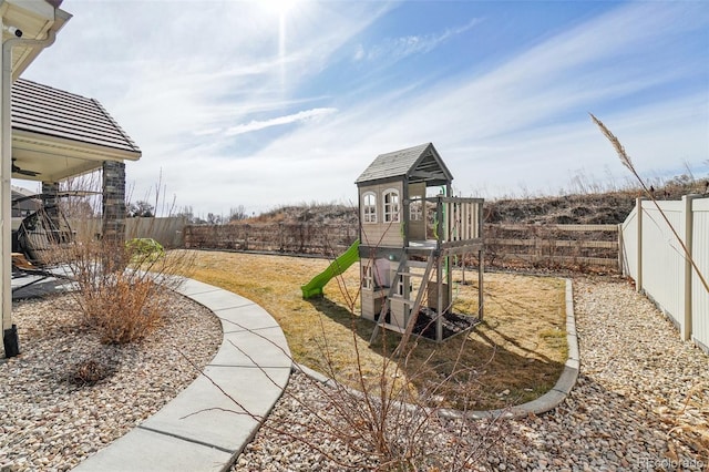 view of play area featuring a fenced backyard