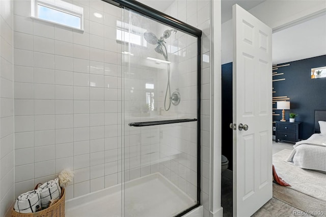 10123 Zeno St, Commerce City, CO 80022 - full bath with ensuite bath, a shower stall, and toilet