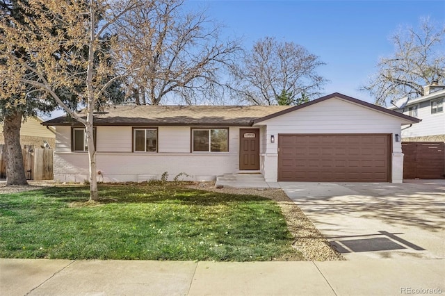 single story home with a front yard and a garage