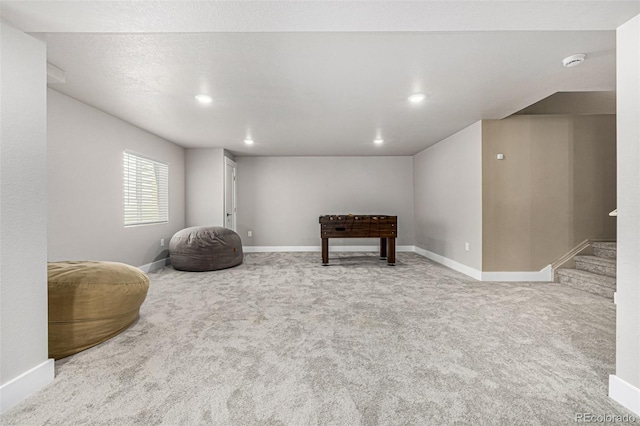 sitting room with carpet floors, baseboards, and recessed lighting