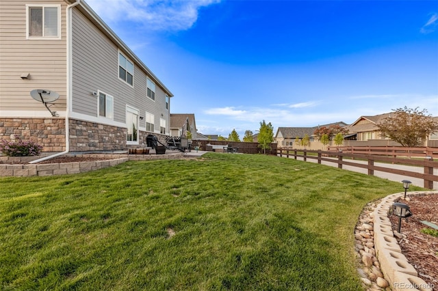 view of yard featuring a residential view
