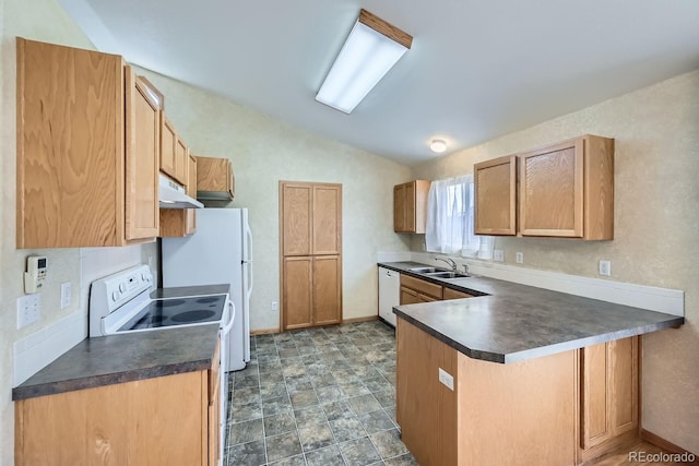 kitchen featuring kitchen peninsula, lofted ceiling, sink, and white appliances