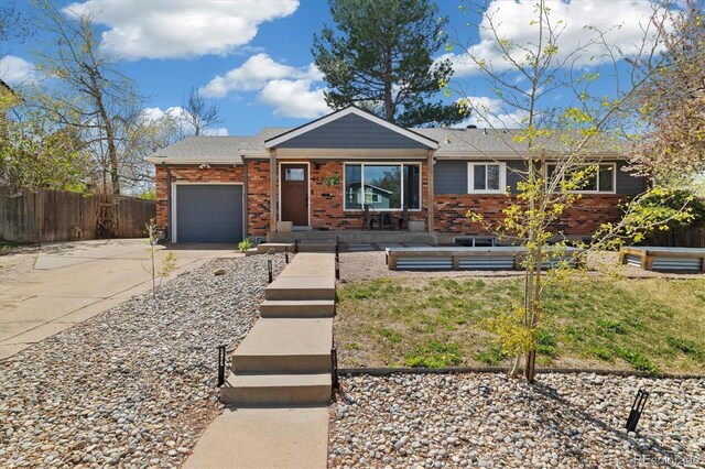 882 E Briarwood Cir, Centennial, CO 80122 - single story home with fence, roof with shingles, brick siding, an attached garage, and driveway