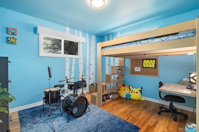 882 E Briarwood Cir, Centennial, CO 80122 - bedroom with baseboards and wood finished floors