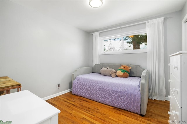 882 E Briarwood Cir, Centennial, CO 80122 - bedroom featuring baseboards and wood finished floors