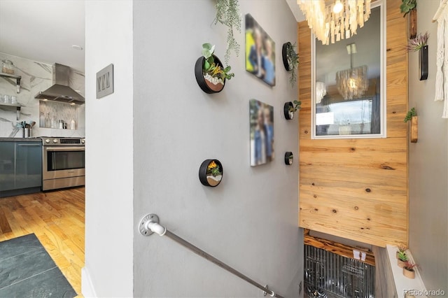 882 E Briarwood Cir, Centennial, CO 80122 - interior space with backsplash, wood finished floors, and a chandelier