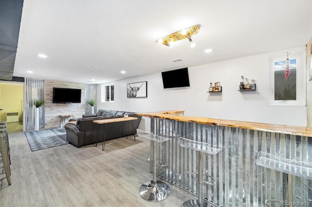 882 E Briarwood Cir, Centennial, CO 80122 - bar featuring recessed lighting, a dry bar, and wood finished floors