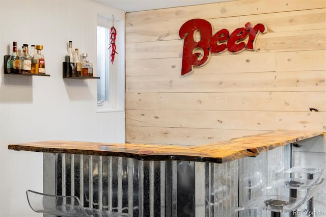 882 E Briarwood Cir, Centennial, CO 80122 - bar featuring a bar and wood walls