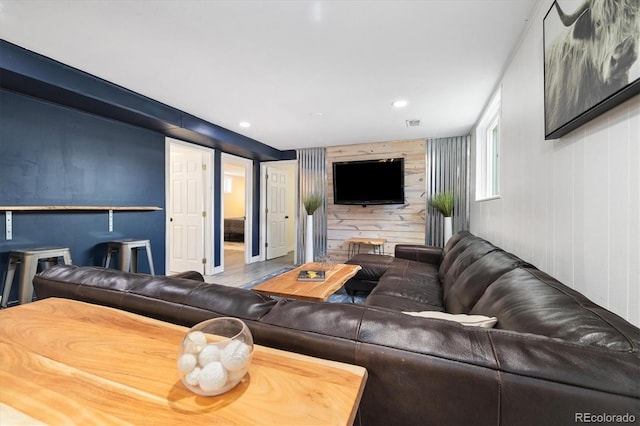 882 E Briarwood Cir, Centennial, CO 80122 - living area featuring wood walls, recessed lighting, and visible vents