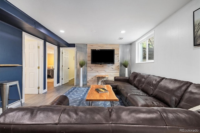 882 E Briarwood Cir, Centennial, CO 80122 - living area featuring recessed lighting, baseboards, wood finished floors, and wooden walls