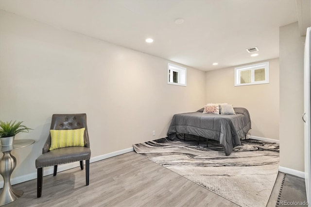882 E Briarwood Cir, Centennial, CO 80122 - bedroom with baseboards, recessed lighting, wood finished floors, and visible vents
