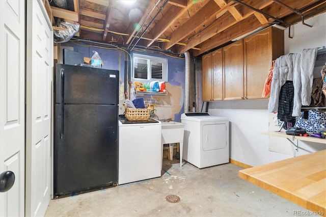 882 E Briarwood Cir, Centennial, CO 80122 - laundry room featuring baseboards, cabinet space, and independent washer and dryer