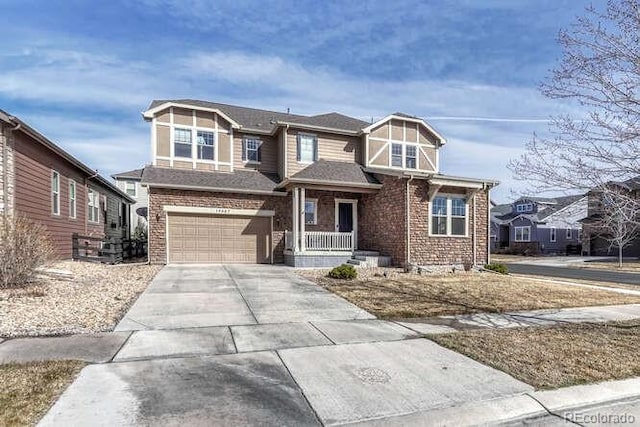 view of front of home featuring concrete driveway and a garage