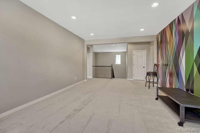 interior space with recessed lighting and baseboards