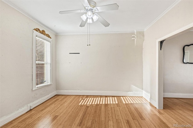 spare room with ceiling fan, light hardwood / wood-style floors, and ornamental molding