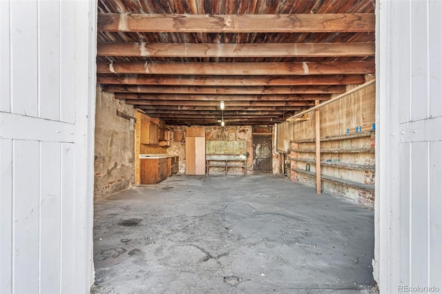 misc room with concrete flooring