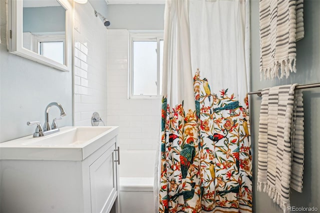 bathroom featuring vanity, toilet, and shower / tub combo with curtain