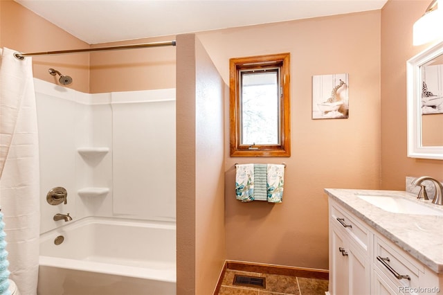 full bathroom featuring baseboards, vanity, shower / tub combo with curtain, and visible vents