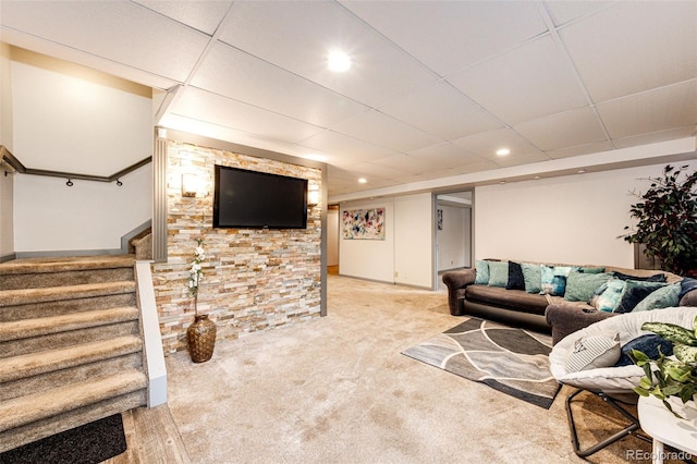 living area featuring recessed lighting, stairway, a drop ceiling, and light carpet