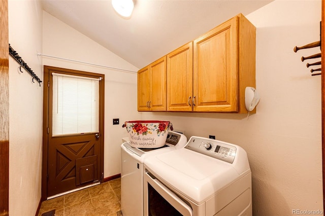 laundry area with separate washer and dryer and cabinet space
