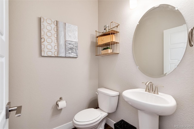 9804 Rosalee Peak St, Littleton, CO 80125 - bathroom featuring toilet and a sink