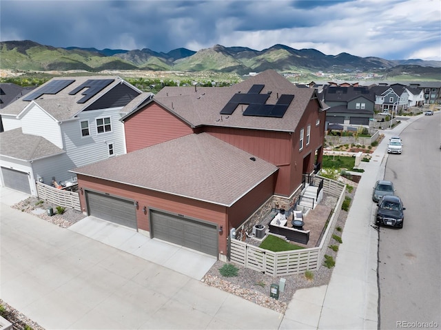 9804 Rosalee Peak St, Littleton, CO 80125 - aerial perspective of suburban area featuring a mountain backdrop